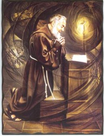 Le Saint Padre Pio priant